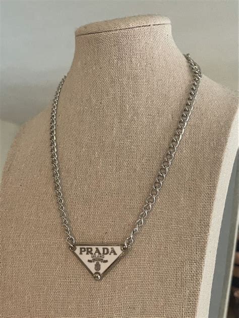 prada baumschmuck|Prada silver necklace.